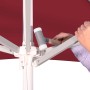 Detailaufnahme: Bordeaux Marktschirm Jumbo (Ø 400 cm) mit Seilzugmechanik in Bedienung.