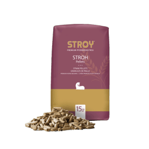 STROY Strohpellets 15kg: lila-goldene Packung Pferdeeinstreu und ein Haufen heller Pellets.