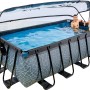 Rechteckiger EXIT Stone Pool 400x200x122 cm mit Abdeckung, Sandfilterpumpe und Wärmepumpe. Personen im Pool.