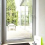 ASTRA Sauberlaufmatte Jade Beige, 80x120 cm vor einer Terrassentür. Fußmatte für Innen.