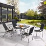 Rechteckiger, grauer Gartentisch Vigo (70x110 cm) mit vier Stühlen auf einer Terrasse.