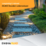 ENOVALITE LED Gartenstrahler 4er Set beleuchtet Gartenweg mit Steinplatten und Kies.