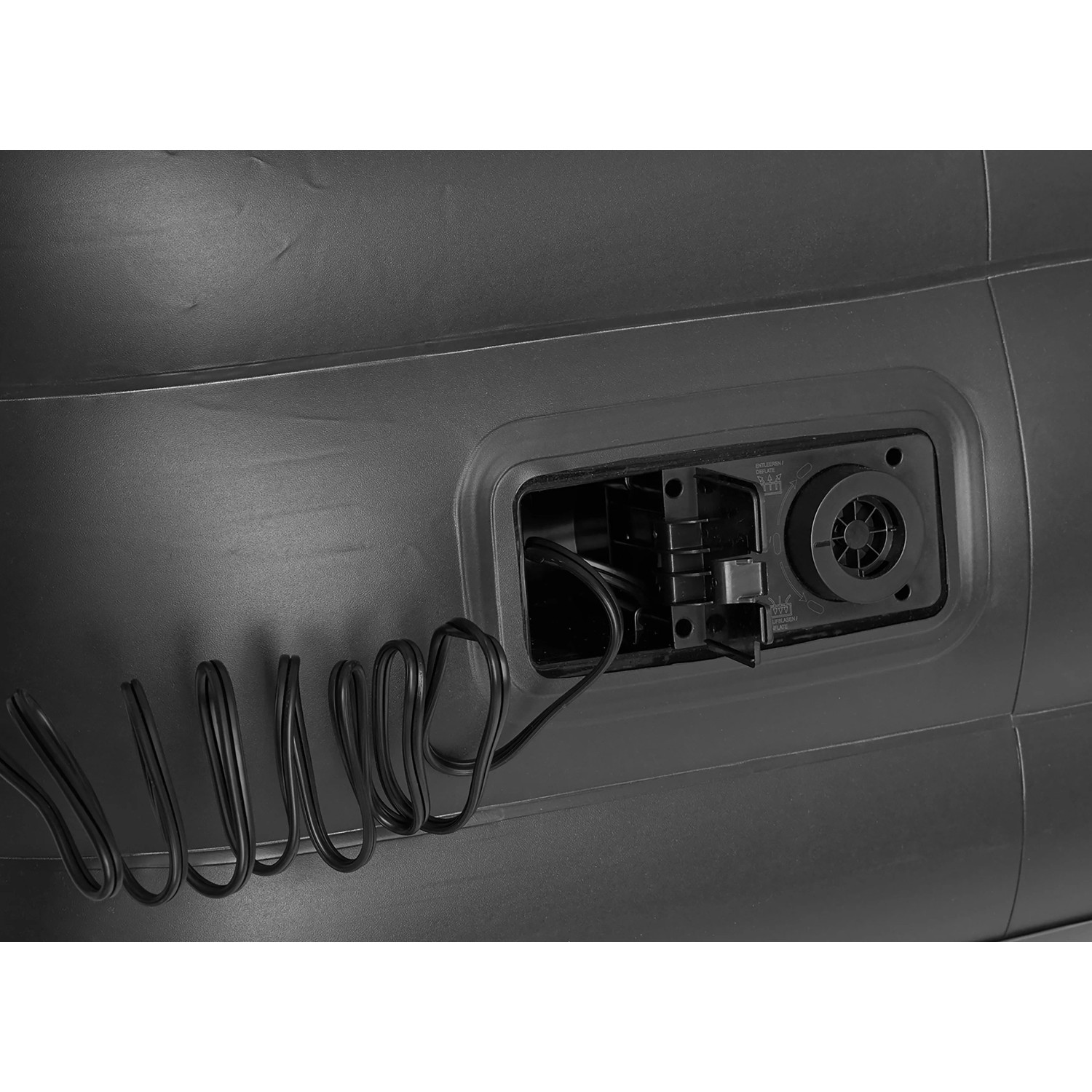 Detailaufnahme: Integrierte Elektropumpe des Happy People Gästebetts in Schwarz-Beige.