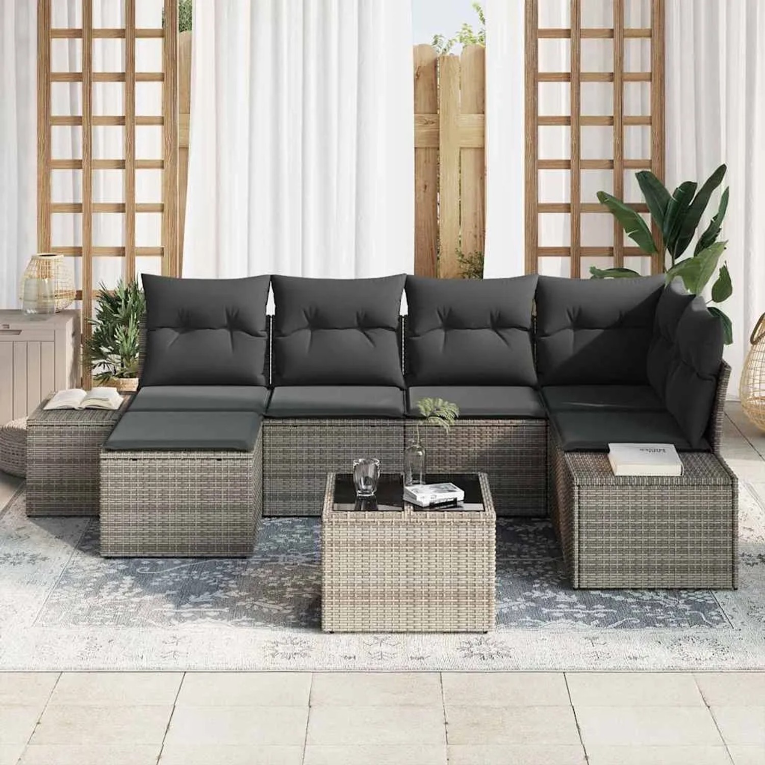 Graues 7-teiliges vidaXL Garten-Sofa-Set aus Poly Rattan mit Kissen und Tisch.