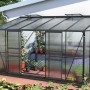 Vitavia Gewächshaus Ida 7800, schwarzes Anlehngewächshaus mit Pflanzen auf 7,8 m² Fläche.