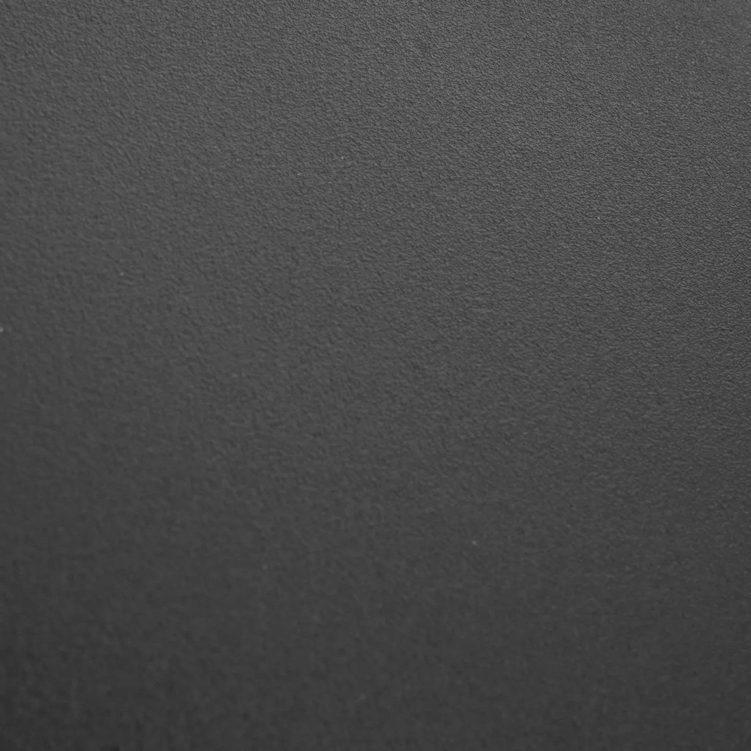 Detailaufnahme der Oberfläche einer schwarzen MCW Schubladenbox L98 für Kaffeekapseln.