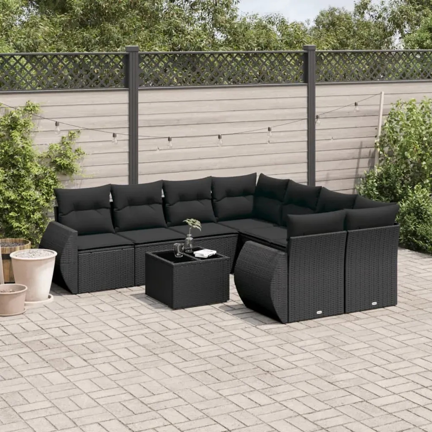 Schwarze 9-tlg. vidaXL Garten-Sofagarnitur aus Poly Rattan mit Kissen.