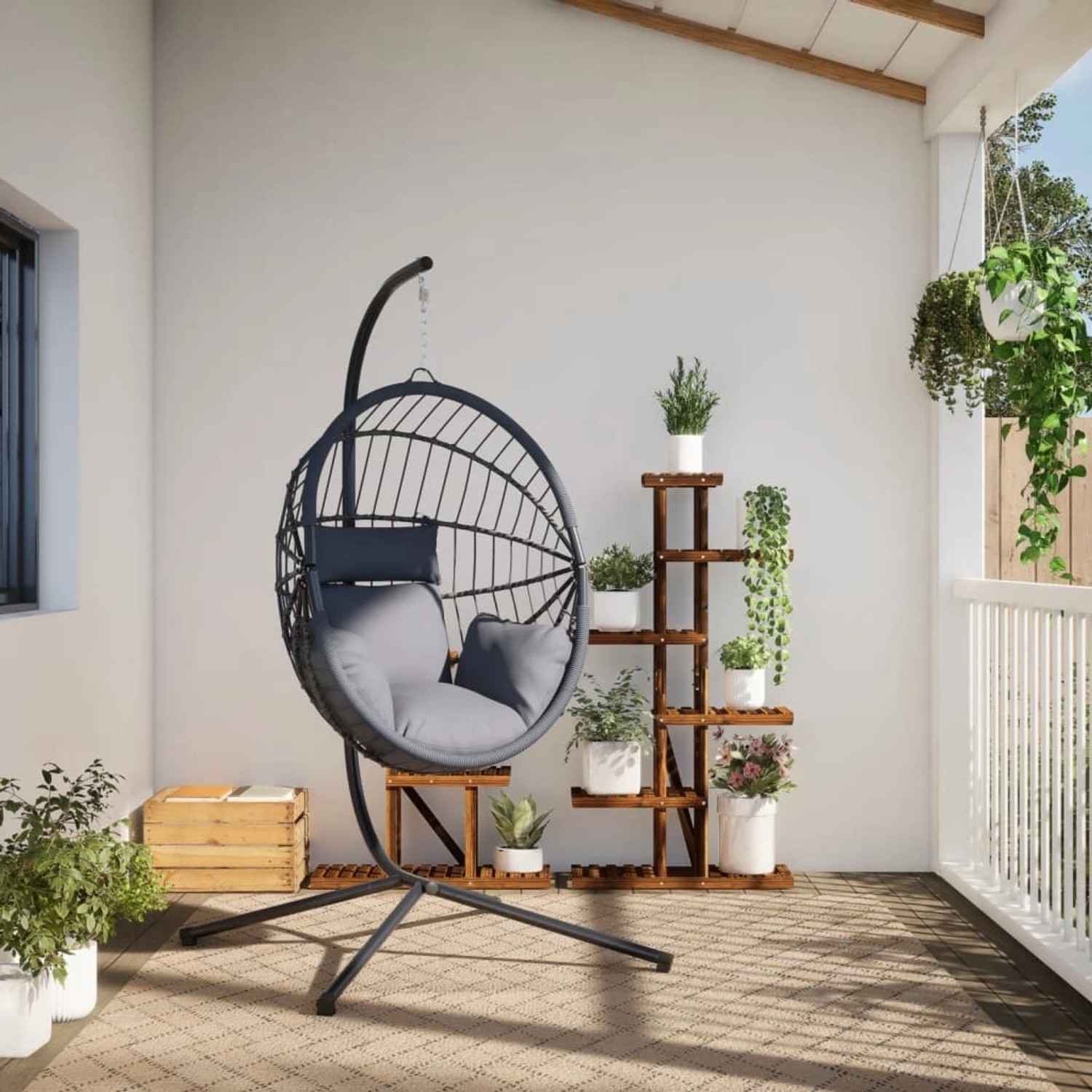 Grauer vidaXL Hängesessel Ei-Design mit Stahlgestell und Rattan-Korb für entspannte Stunden im Garten oder auf der Terrasse.