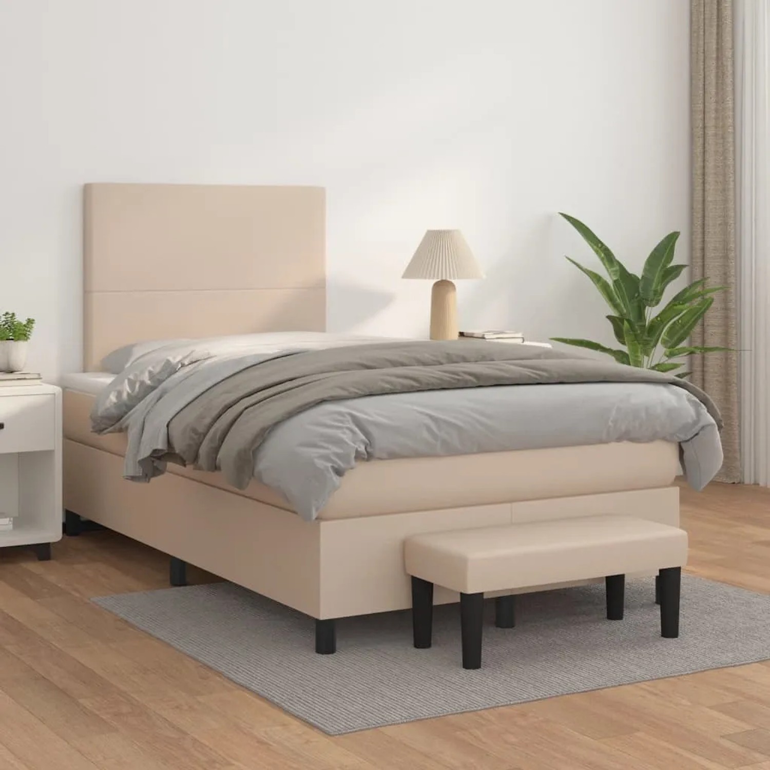 Boxspringbett 120x190 cm in Cappuccino-Braun mit Matratze und Bank aus Kunstleder.