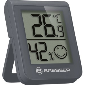 BRESSER Thermo-Hygrometer in Grau zeigt Temperatur 26.9°C und Luftfeuchtigkeit 42% mit Smiley.