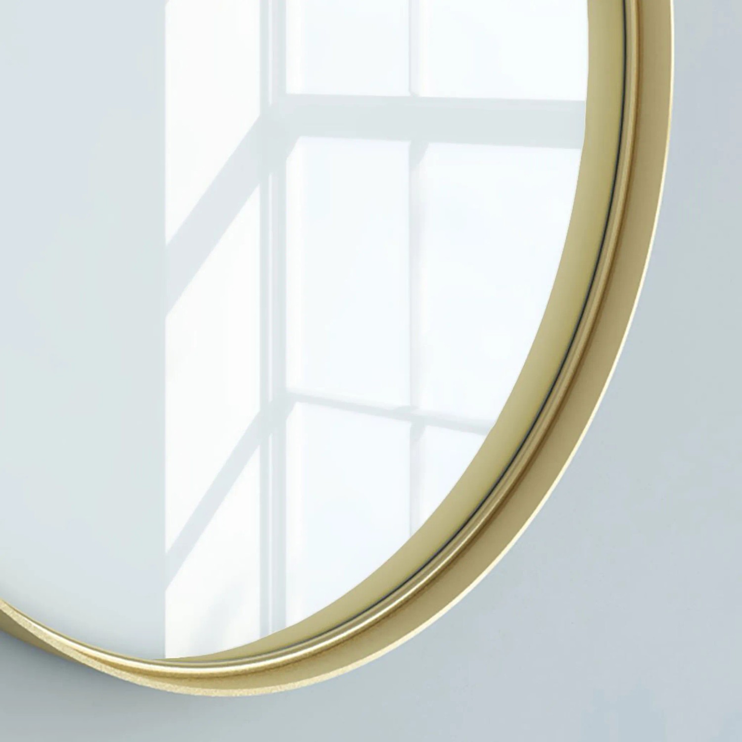 Runder Spiegel Randal, Ø 60 cm, goldener Metallrahmen, glänzende Optik.