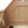 Innenansicht der Dewello Infrarotkabine Ottawa aus Hemlock-Holz mit Sternenhimmel und Sitzbank.