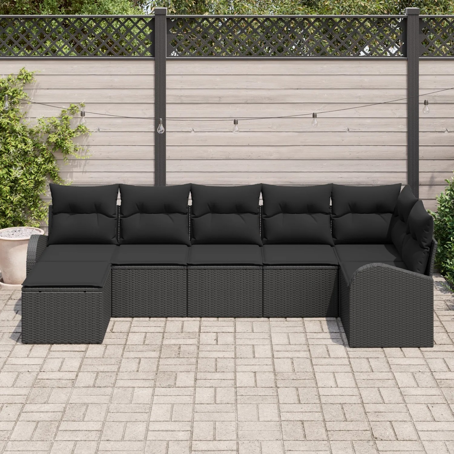 Schwarzes 7-teiliges Garten-Sofa-Set aus Poly Rattan von vidaXL für Garten oder Terrasse.