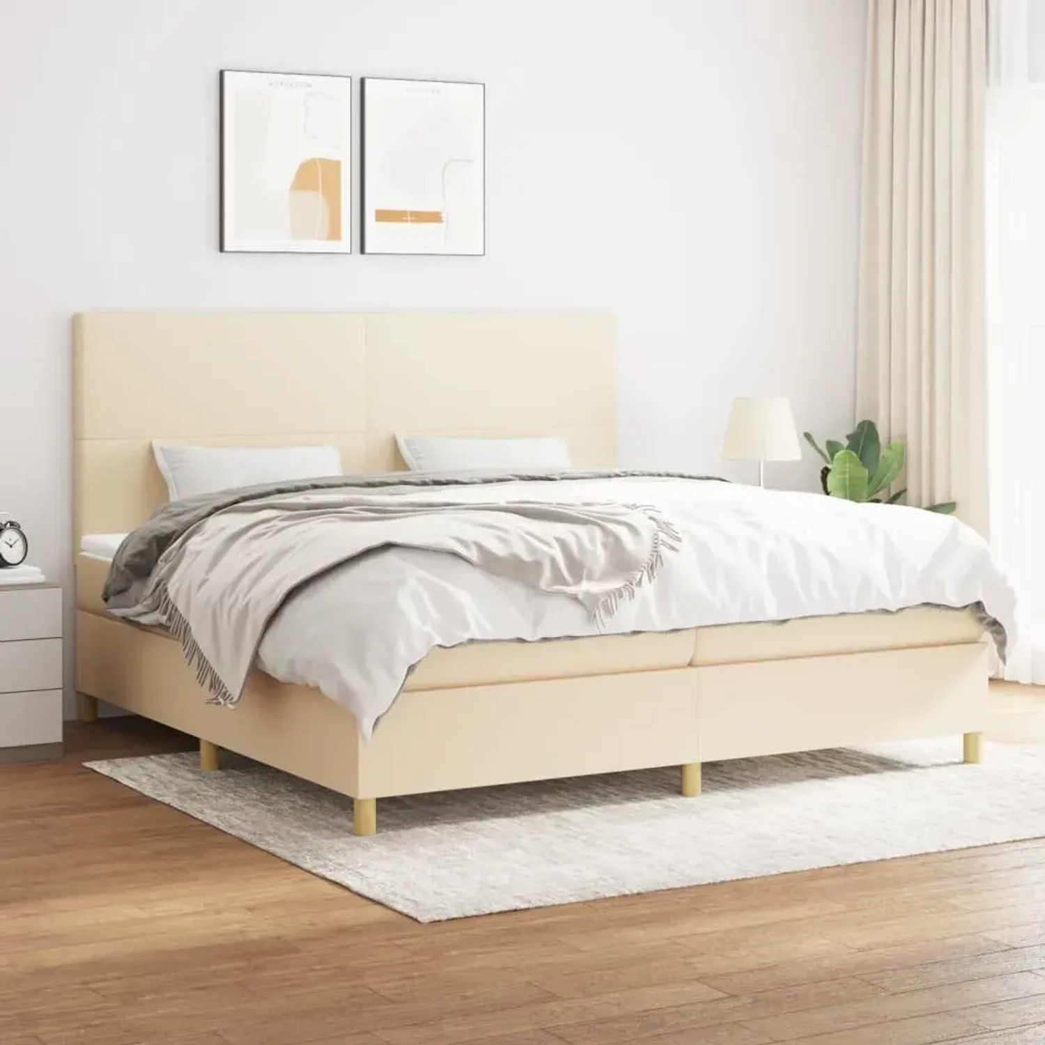 Cremefarbenes vidaXL Boxspringbett 200x200 cm mit Matratze und Kopfteil.