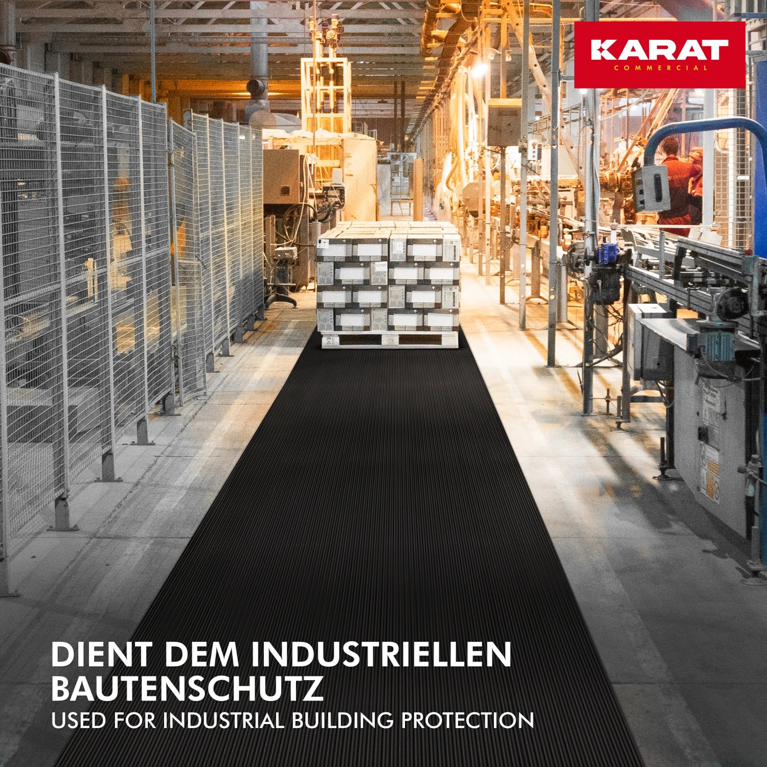 KARAT Gummiläufer, fein gerippt, als Bodenschutz in Industriehalle. Rutschfeste Gummimatte.