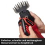 Einhell Akku-Gras- und Strauchschere GE-CG 18/100 Li-Solo mit Strauchscheren-Aufsatz in der Hand.
