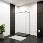 Rechteckige, schwarze Duschwanne 120x90 cm mit Stein-Effekt und Duschkabine im modernen Badezimmer.