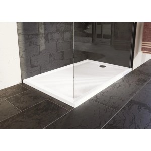 Weiße, rechteckige Hüppe Duschwanne Purano 90/90 mit gerillter Oberfläche und Ablauf.