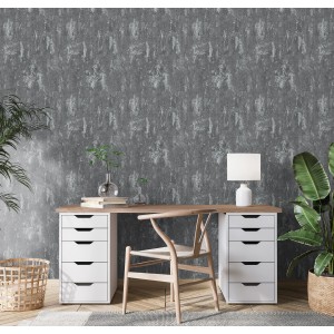 Erismann Vliestapete Casual Chic in Betonoptik Dunkelgrau hinter einem Schreibtisch.