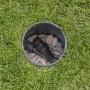 Gardena Druckminderer im Sprinkler-System: gleicht Druck aus, eingebaut in Ventilbox mit Steinen.