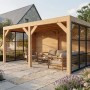 Moderne weka Gartenlaube Lumley aus Fichte mit Flachdach, Glaswänden im Sprossenlook, als Terrassenüberdachung mit Lounge.
