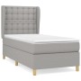 Hellgraues vidaXL Boxspringbett 90x190 cm mit Stoffbezug und Matratze.