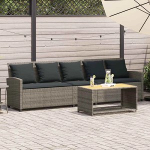 Graues 5-Sitzer Gartensofa aus Poly Rattan mit dunklen Kissen und Tisch. Gartenmöbel Set.