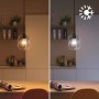 Philips Smart LED Lampe E27, Tropfenform, mit warmweißem und kaltweißem Licht in verschiedenen Farben.