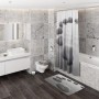 Sanilo Badteppich Black Stones 70x110 cm im Badezimmer mit Dusche und Waschbecken.