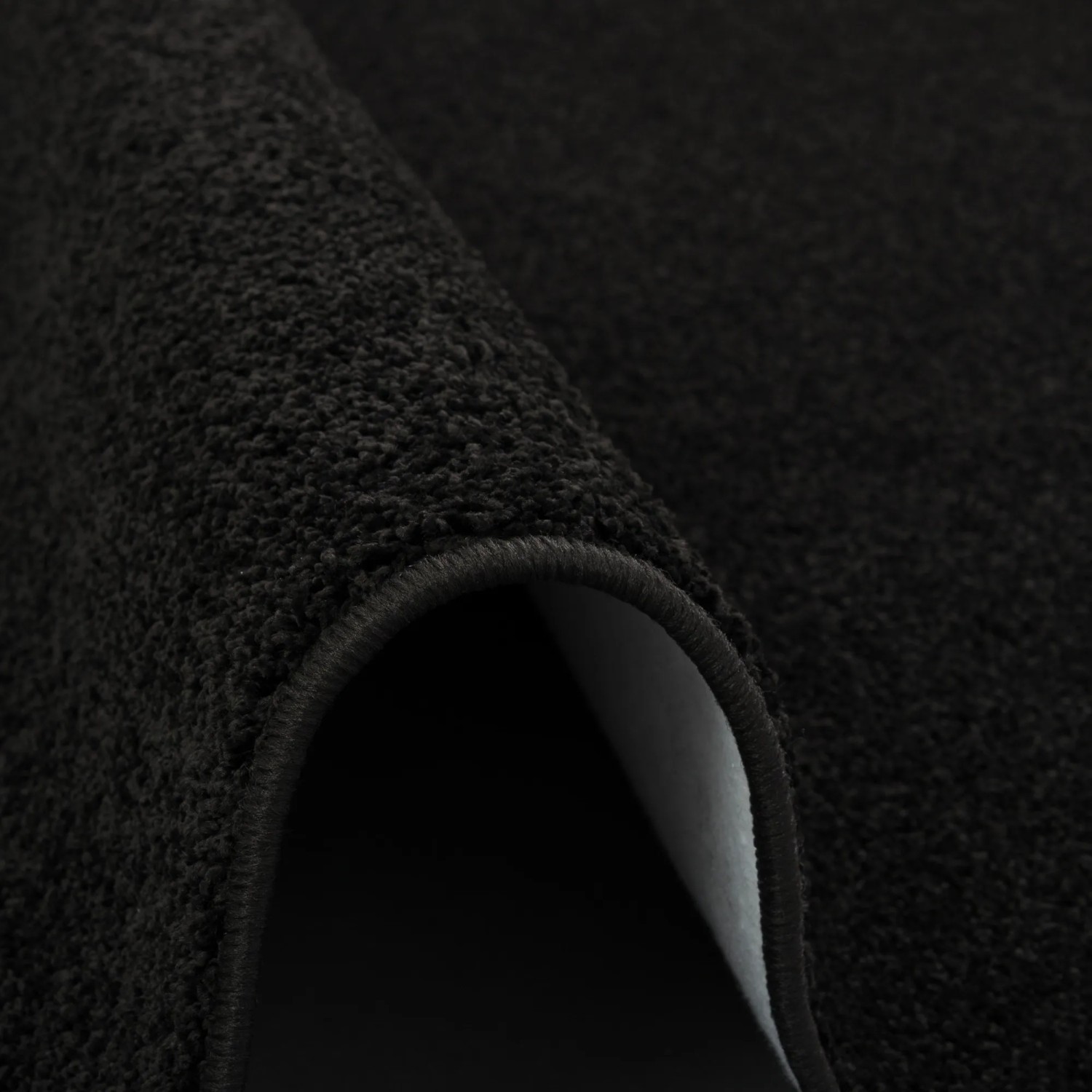Detailaufnahme: Schwarzer Snapstyle Hochflor Teppichläufer Cottage, 80x240cm.