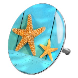 Sanilo Badewannenstöpsel Sea Star mit Seestern-Motiv auf blauem Holz.