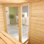Weka Massivholzsauna Valida Eck mit Glastür, Innenansicht mit Liege und Ofen-Sparset.