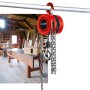 Einhell Kettenflaschenzug TC-CH 1000, rot, mit Kette und Haken in Werkstatt.