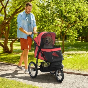 Roter PawHut Hundewagen aus Polyester und Stahl mit Mann und Hund im Park.