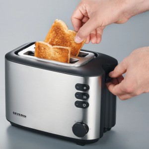 Severin AT 2514 Toaster: Silberner Toaster mit Brötchenaufsatz und zwei Toastscheiben.