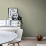 ESTAhome Vliestapete mit grafischen Linien in Salbeigrün im Wohnraum.