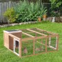 PawHut Kaninchenstall mit Freilaufgehege und Schutzhütte im Garten.