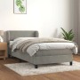 Hellgraues vidaXL Boxspringbett 90x200 cm mit Samtbezug, inklusive Matratze und Topper.