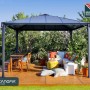Canopia Gartenpavillon Palermo 3.6x3.6 Anthrazit mit Sitzgruppe auf Holzterrasse.