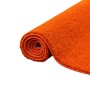 Gerollter, orangefarbener Snapstyle Hochflor Teppich Palace, 100x100 cm. Flauschiger Shaggy Teppich.