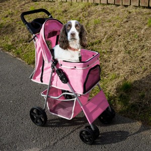 Rosa Monstershop Haustierwagen mit Hund im Korb. Ideal für Ausflüge mit Ihrem Liebling.