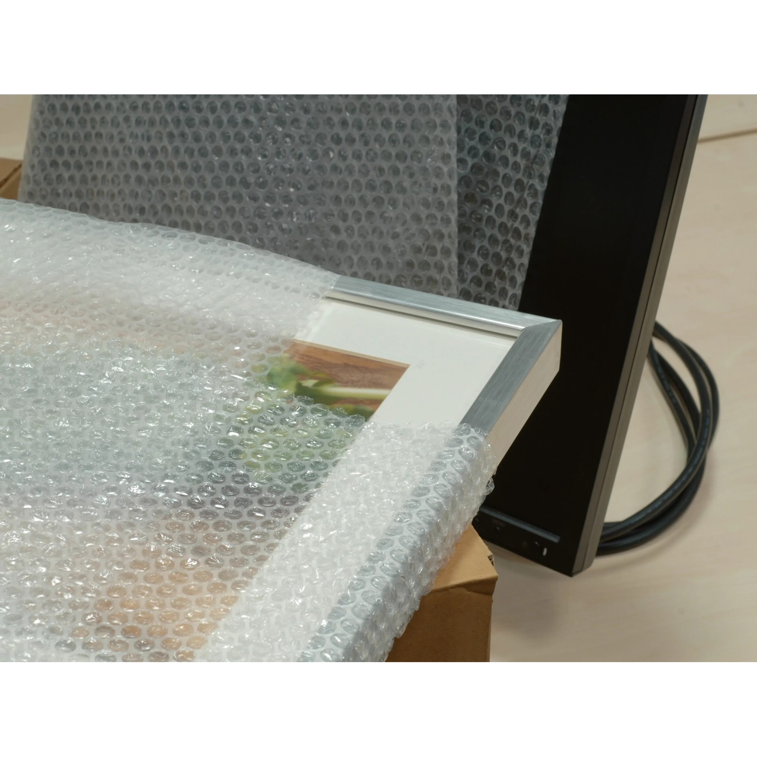 Verpackte Luftpolsterfolie (2 m x 5 m) zum Schutz von Umzugsgütern.