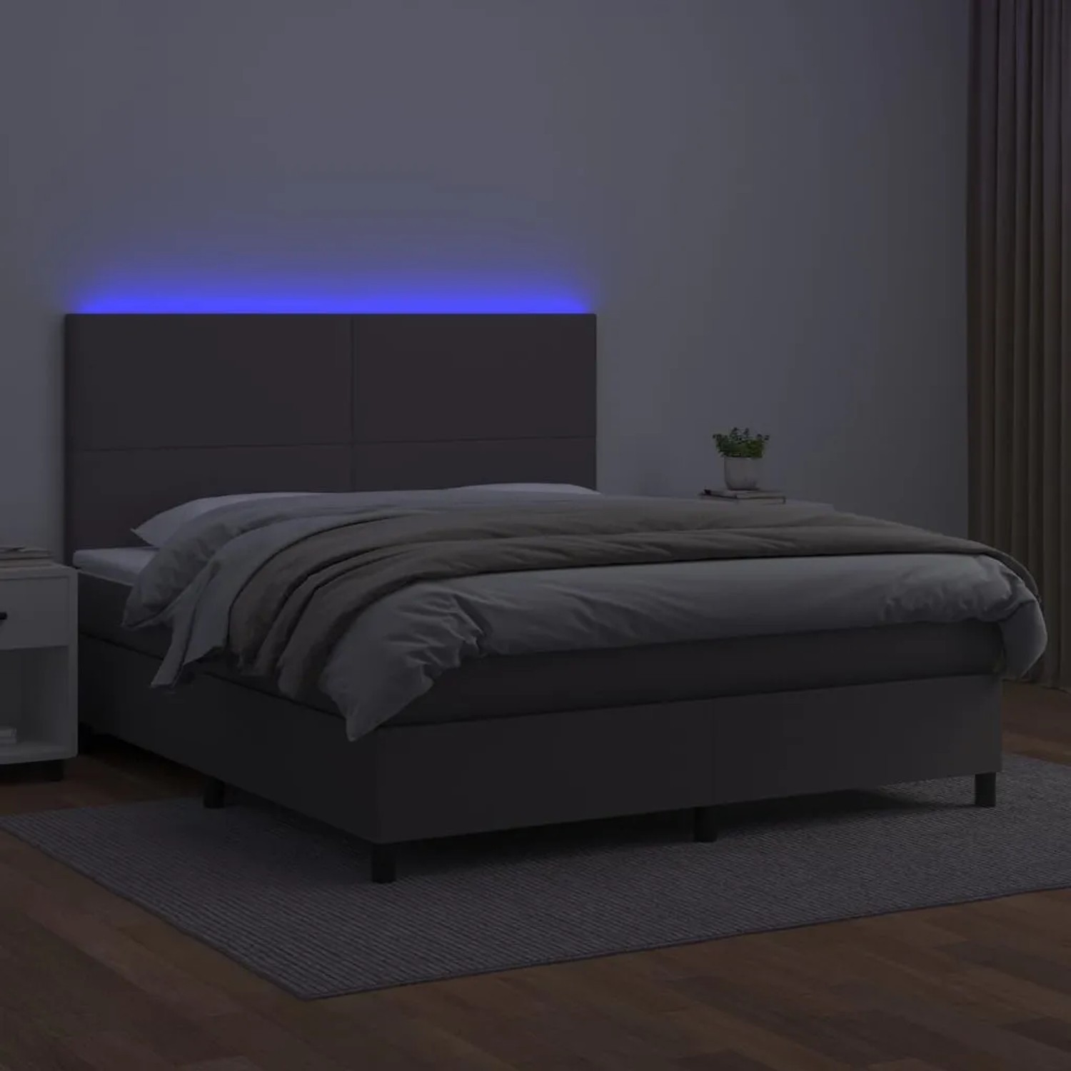 Graues vidaXL Boxspringbett (160x200 cm) mit LED-Beleuchtung am Kopfteil.