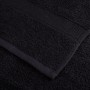 Detailaufnahme: Schwarzes, flauschiges Handtuch aus dem 8-teiligen Premium-Set aus Baumwolle.