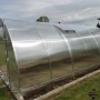 Garten Dream Gewächshaus Palace 4x10m mit Polycarbonatplatten im Garten.