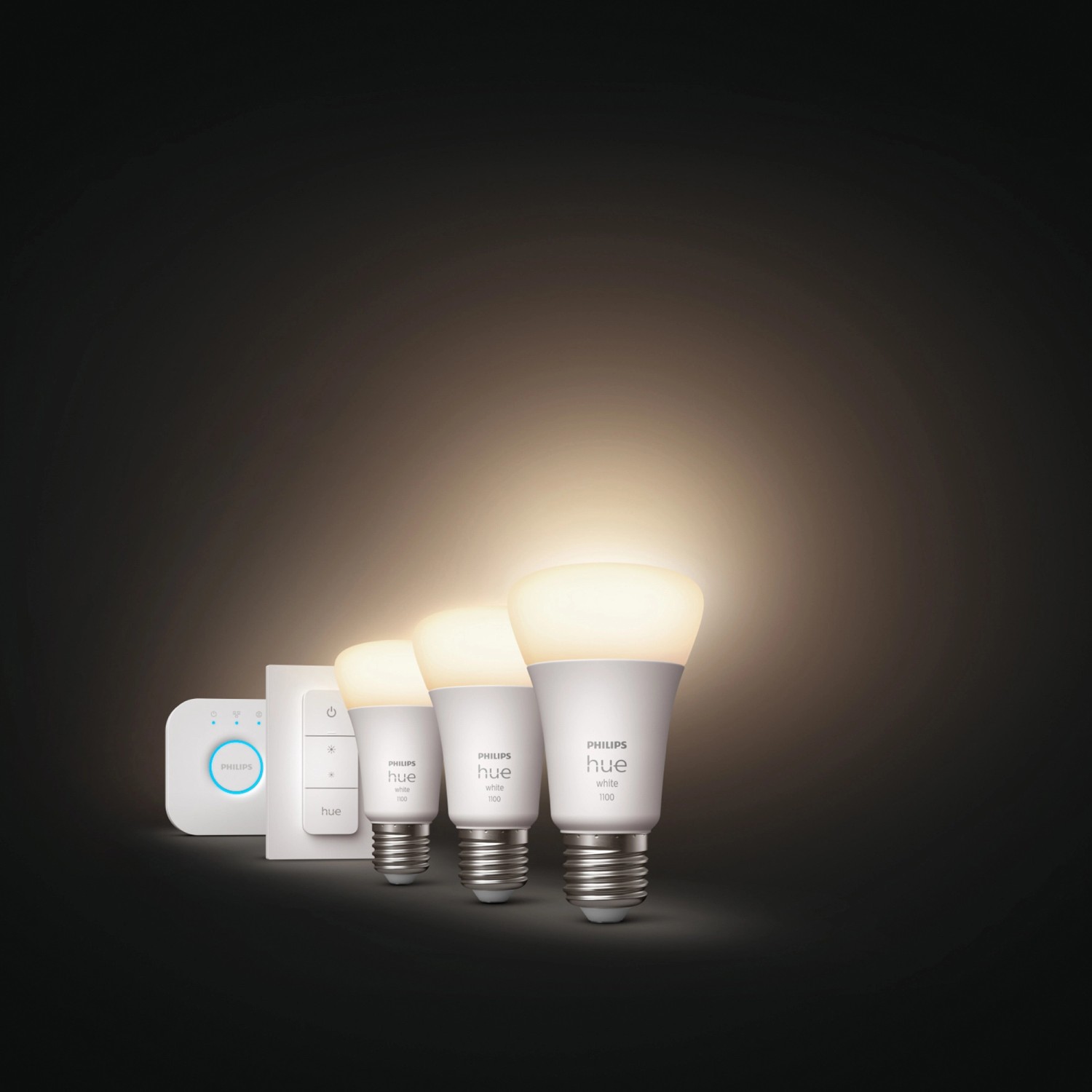 Philips Hue Starter-Set mit 3 E27 Leuchtmitteln, Dimmschalter und Hue Bridge.