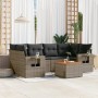 7-tlg. Garten-Sofagarnitur aus grauem Poly Rattan mit dunklen Kissen und Tisch.