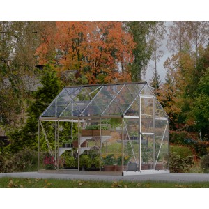 Palram Canopia Gewächshaus Silber 4,6 m² mit Fundamentrahmen im Garten.