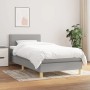 Helles, graues vidaXL Boxspringbett 90x190 cm mit Matratze und Kopfteil.