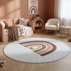 Runder, creme-farbener Ayyildiz Kinderteppich Coco (Ø 120 cm) mit Regenbogen und Punkten im Kinderzimmer.